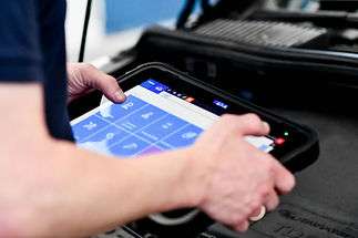 A person operates a touchscreen device