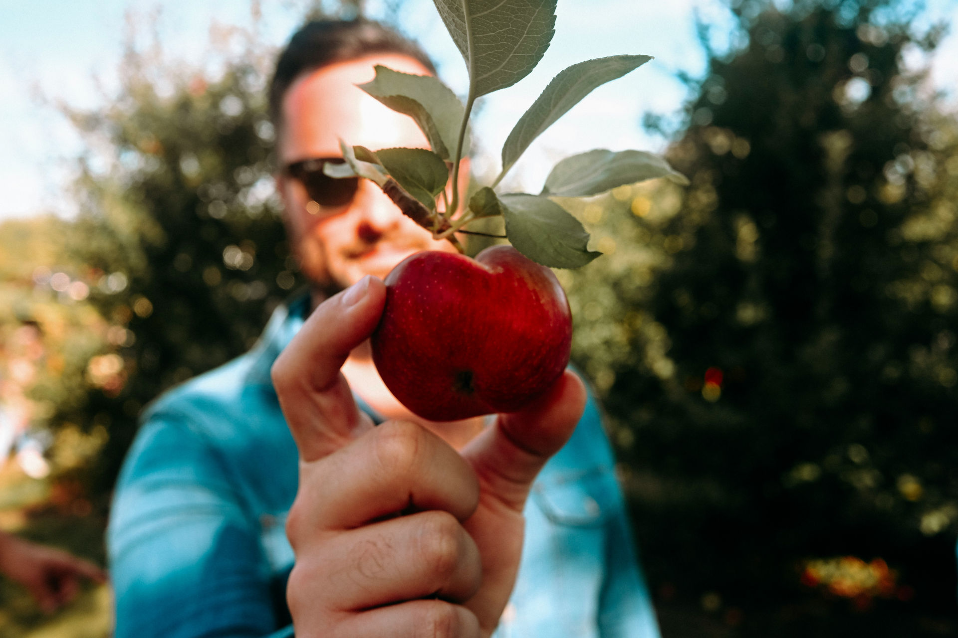 man holding fruit