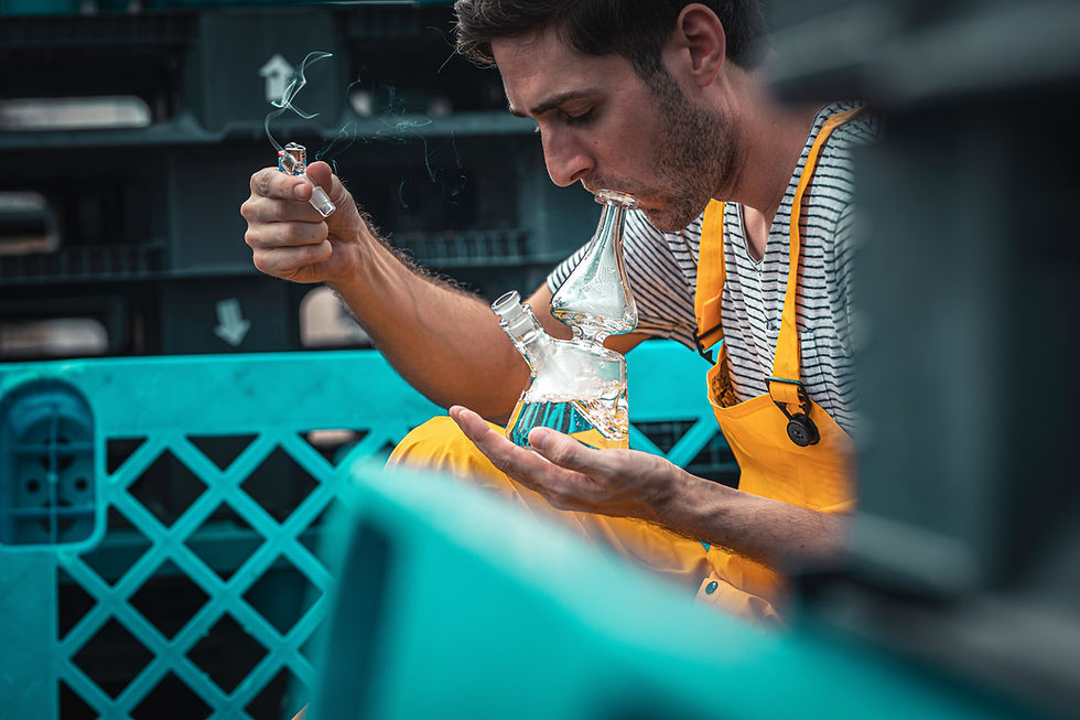 Guy using a bong