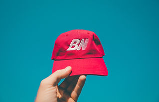 a red cap with a logo