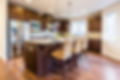 Bright, clean kitchen with hardwood floors – representing Stat Carpet Cleaning professional results