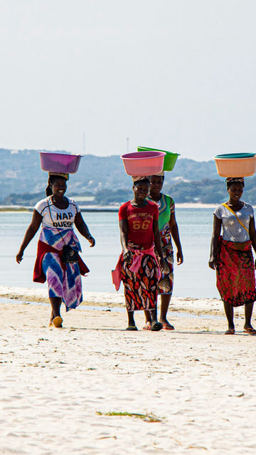women carrying water