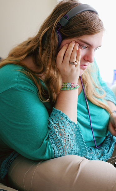 Young person developing independent living skills in supported accommodation for learning disability placements.