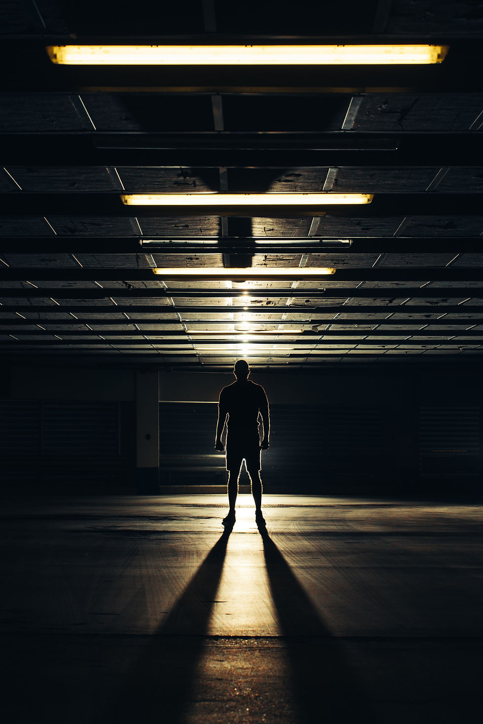 man in the shadows