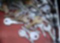 Image shows a pile of keys.