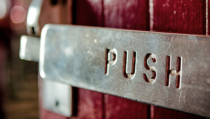 Pushing on a Pull Door