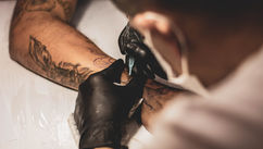 The History of Tattoos in the West: Stigma, Acceptance, and Social Evolution