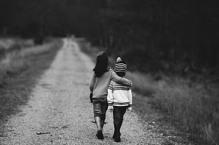 siblings embracing in emotional connection Image by Annie Spratt