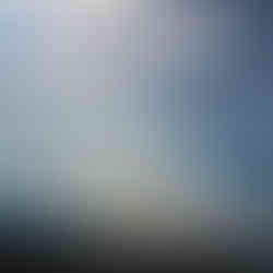 Dramatic aerial view of sunbeams reflecting off the Sea of Galilee from a mountain lookout in Northern Israel.
