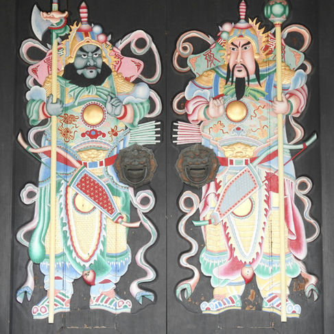 A door with Chinese figures