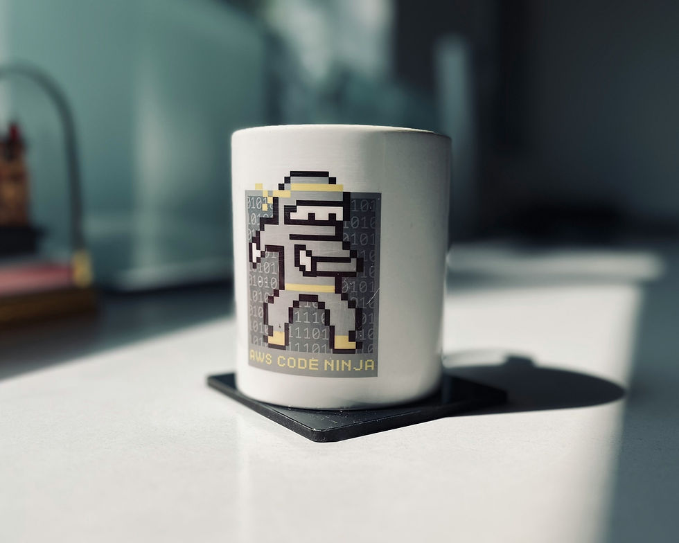 White coffee mug with a pixelated ninja design labeled 'AWS Code Ninja,' placed on a black coaster on a white surface with a blurred background.