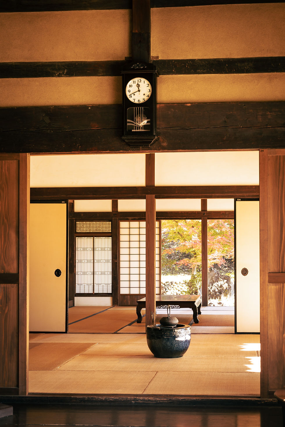 Interior of a traditional Japanese tatami room with shoji sliding doors – photo by S. Tsuchiya