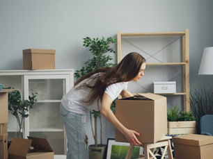 Woman moving a box
