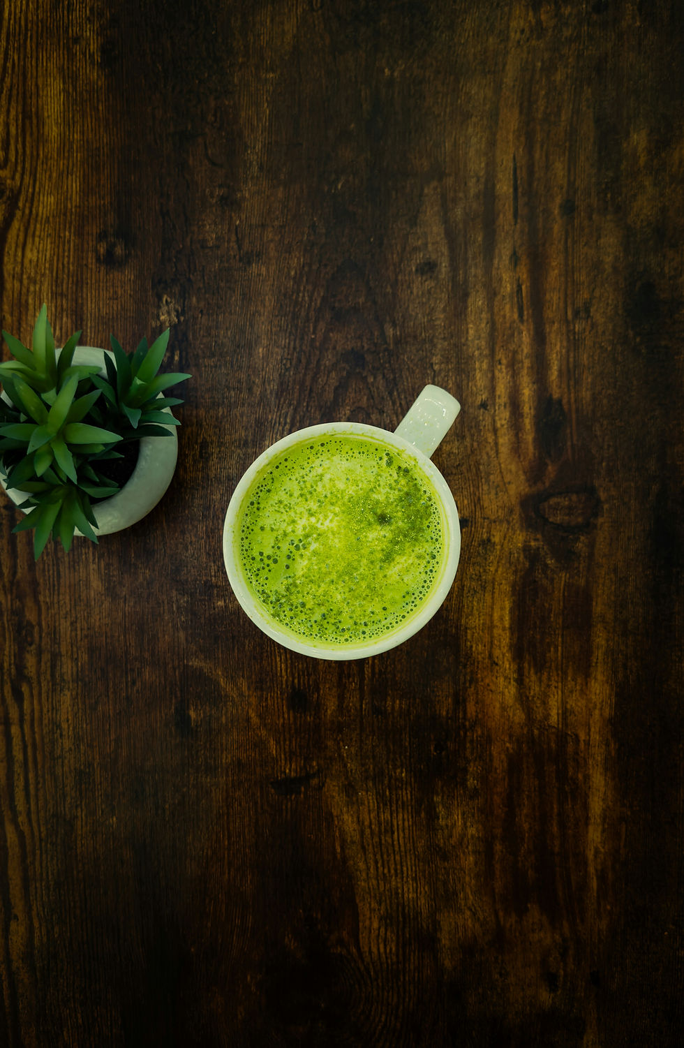 A cup of matcha with foam