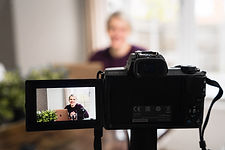 Woman conducting a webinar on camera