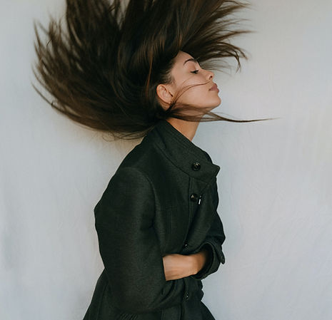 girl flipping long hair