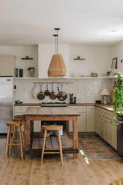 Kitchen island, wooden kitchen island, hanging lights, white tile backsplash, hanging pots, kitchen shelving, wood floors, kitchen remodel in western ma, kitchen remodel contractor in western ma, kitchens in western massachusetts, kitchen contractor, kitchen renovation contractor