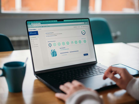 HR Director reviewing a platform dashboard for booking team wellness and cultural experiences in New York City