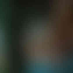 Introduction of long short form videos. An artist filming a TikTok video.