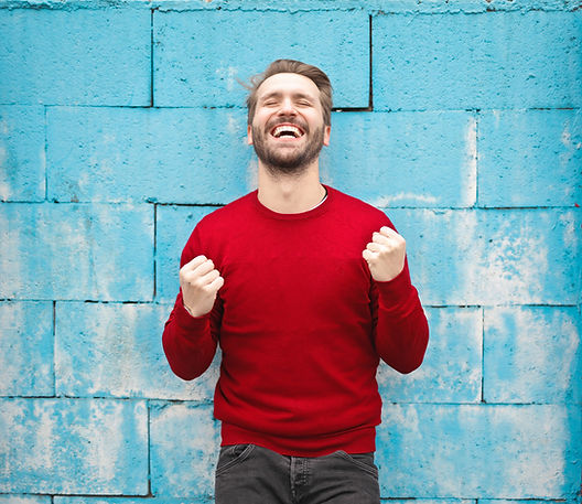 Small business advisor celebrating helping his client grow their business