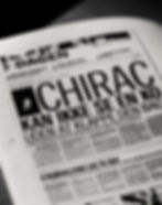 Black-and-white newspaper with bold headline "CHIRAC," in Danish. Monochrome design, close-up angle. Emphasizes text with a serious tone.