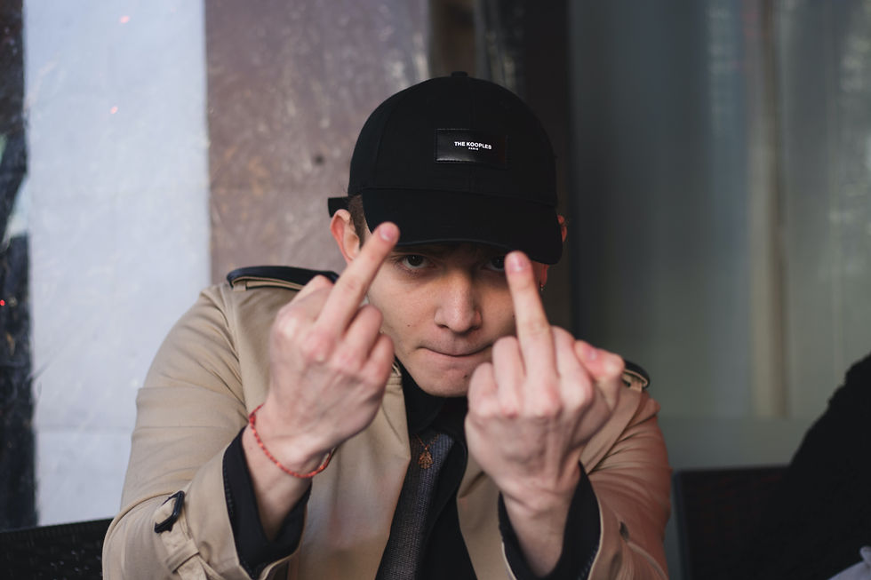 Teen flipping the finger