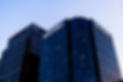 Tall corporate building with many windows