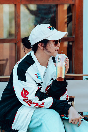 sipping bobba from cup