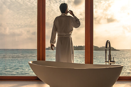 man relaxing in a bathrob