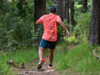 Man Running on a Trail