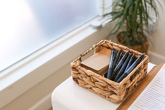 Basket of pens and notebooks showing the work to be accomplished through relationship counselling in London Ontario at 490 Oxford St E