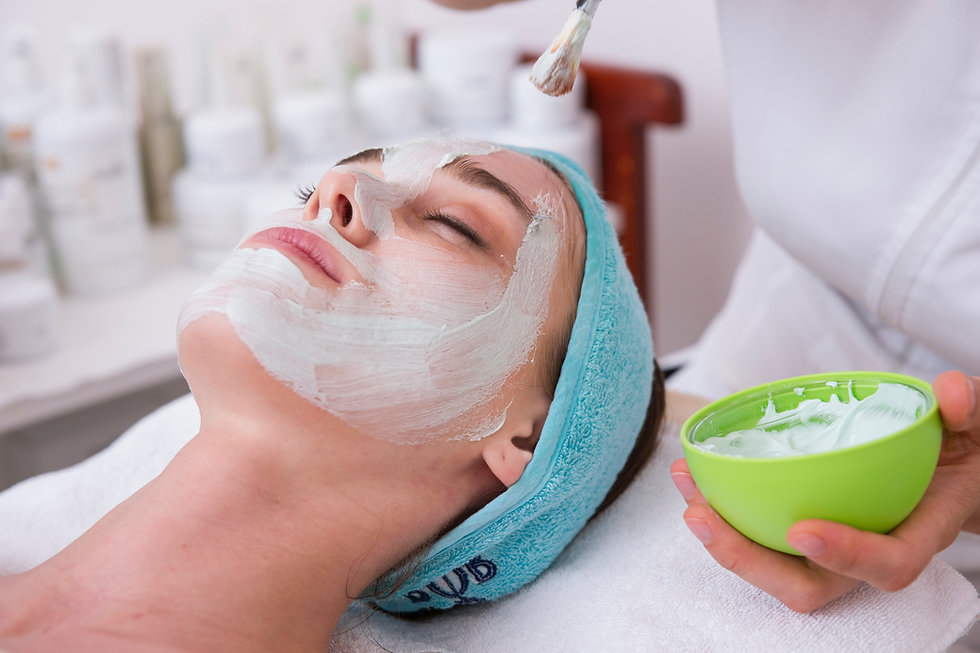 Woman getting a facial in a beauty clinic