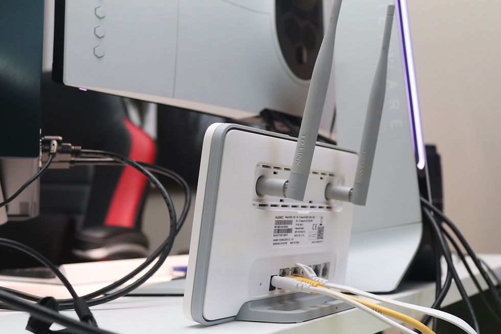 Close up of white wireless router antenna and hardware setup