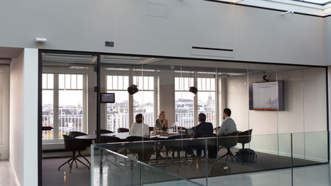 business acquisition structure discussion between buyer and advisor