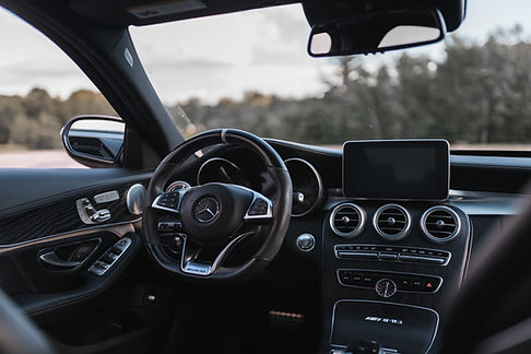 Mercedes-Benz car interior with premium dashboard, leather seats and modern infotainment system | MYEUTAXI