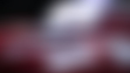 Credit cards and a laptop on the floor symbolizing how high interest credit card debt grows through compound debt.