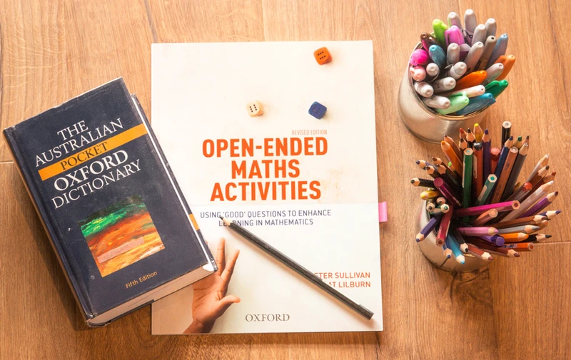 A dictionary and a piece of paper.