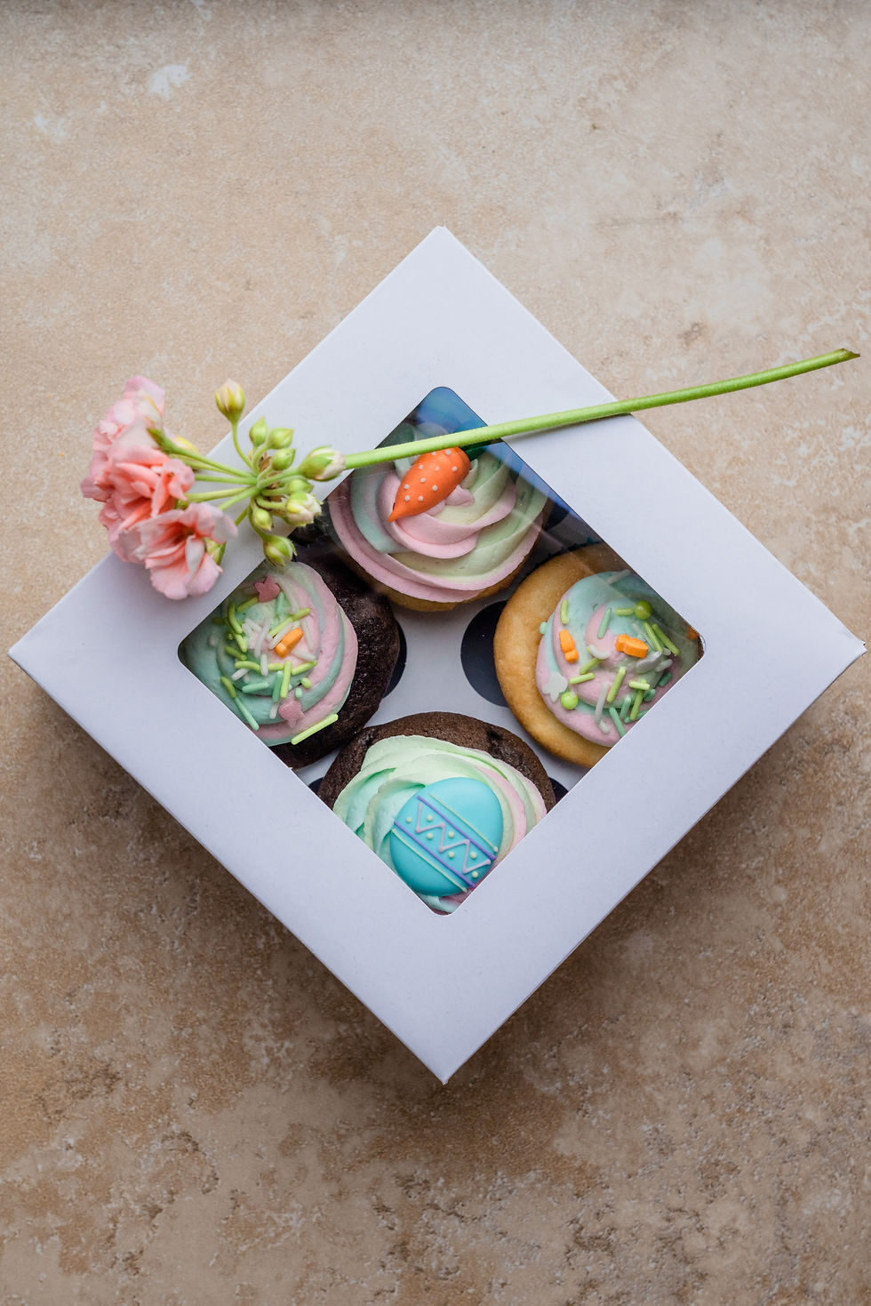 foods to avoid on low carb diets, decorated dohnuts in a gift box.