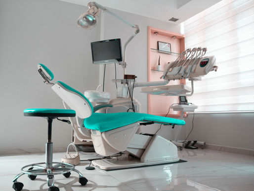 Modern dental clinic in Bali with a dentist treating a patient in a clean, professional setting