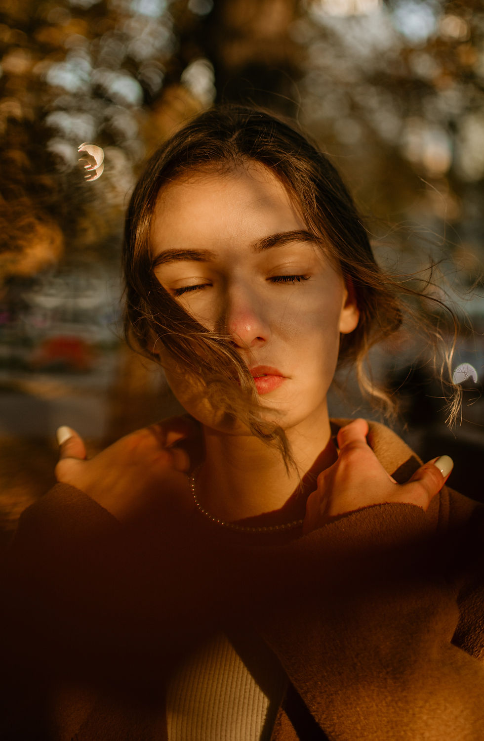 A woman with her eyes closed