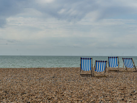 Deck chairs on Brighton beach