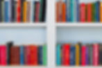 colourful books on bookshelves