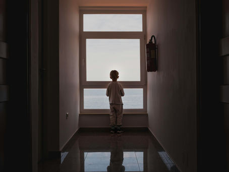 boy at open window