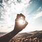 light streaming through a hand signifying clarity