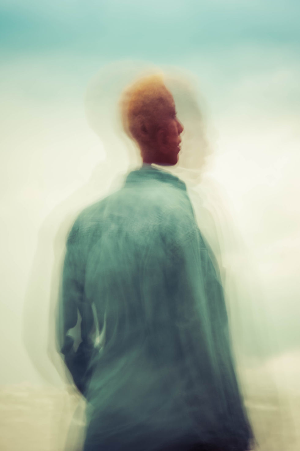 A solitary figure walking across a grassy hill, symbolizing perseverance, career reinvention, and finding a new path when conventional opportunities remain out of reach.