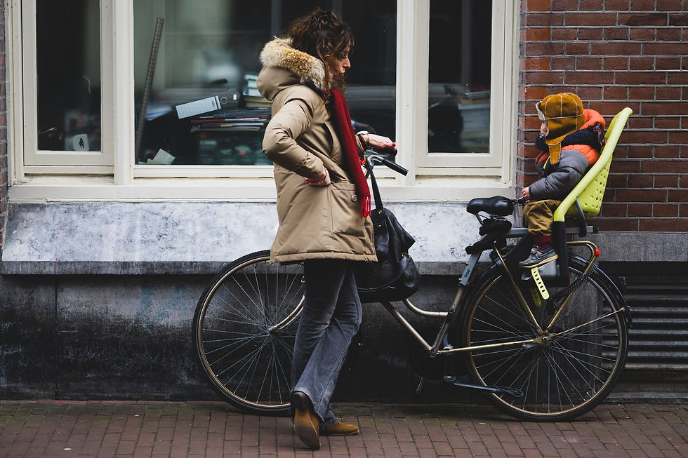 woman and child on bicycle