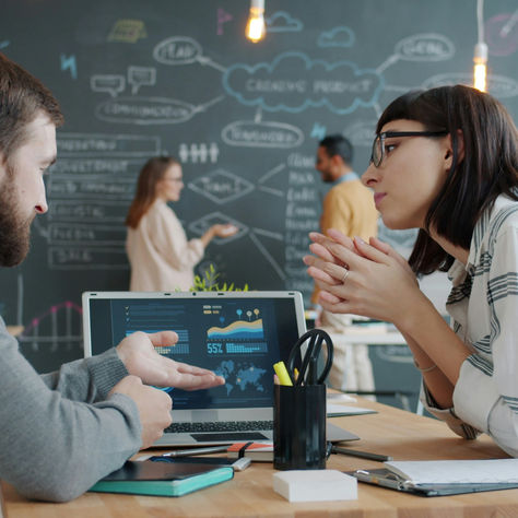 UK small business team strategising marketing and branding to overcome stalled growth