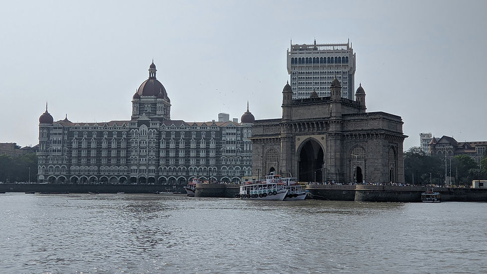Eye-level view of Gateway of India with the Arabian Sea in the background