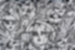 black and white graffiti mural of faces