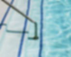 Steps and handrail of a swimming pool